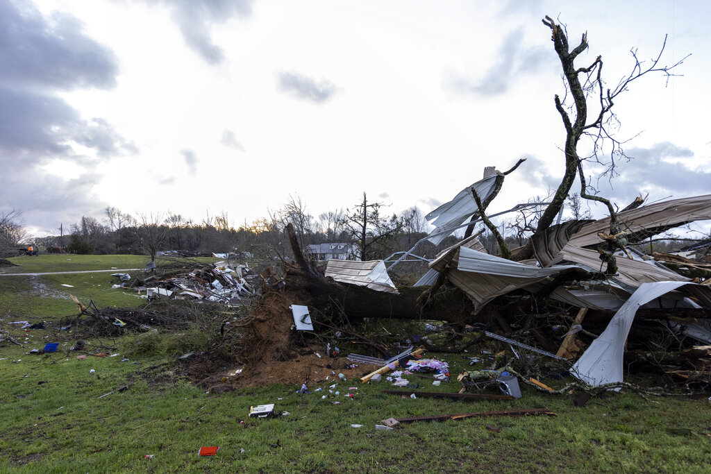 Tornado watch in effect for Southeast, thunderstorms to hit near coast 1 The sun rises over weather-damaged properties at the intersection of County Road 24 and 37 in Clanton, Ala., following a large outbreak of severe storms across the southeast, Thursday, March 18, 2021. Possible tornadoes knocked down trees, toppled power lines and damaged homes in multiple locations across the state of Alabama. (AP Photo/Vasha Hunt)