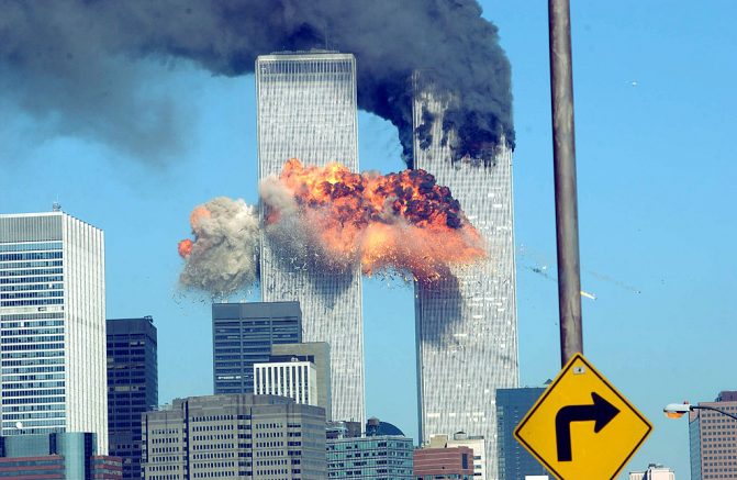 FBI Director Christopher Wray pressed for declassified intel on Sept. 11 attacks 1 A fiery blasts rocks the World Trade Center after being hit by two planes September 11, 2001 in New York City. (Photo by Spencer Platt/Getty Images)