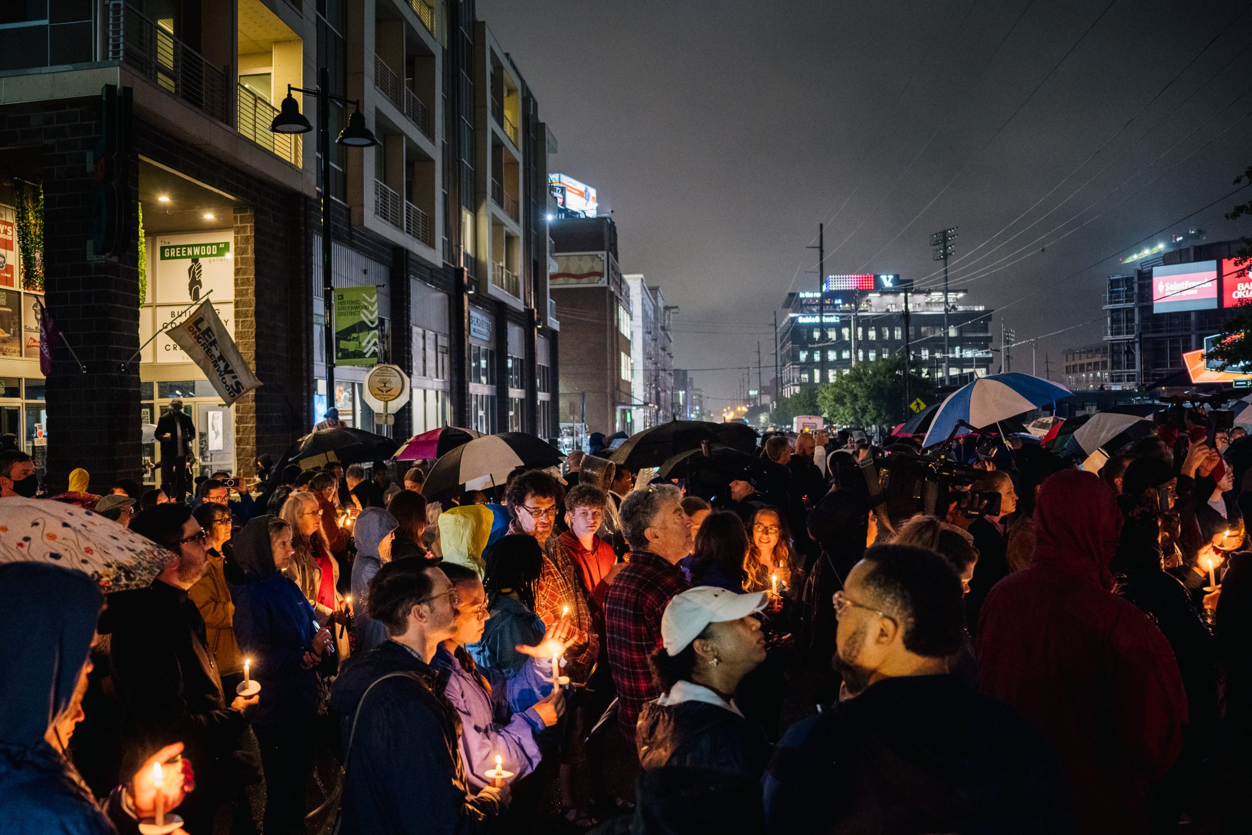 On Centennial Of Tulsa Race Massacre, Biden Admin Announces Moves To Address Wealth Gap For Black Communities 1 People partake in a candlelight vigil in the Greenwood district during commemorations of the 100th anniversary of the Tulsa Race Massacre on May 31, 2021 in Tulsa, Oklahoma. (Brandon Bell/Getty Images)