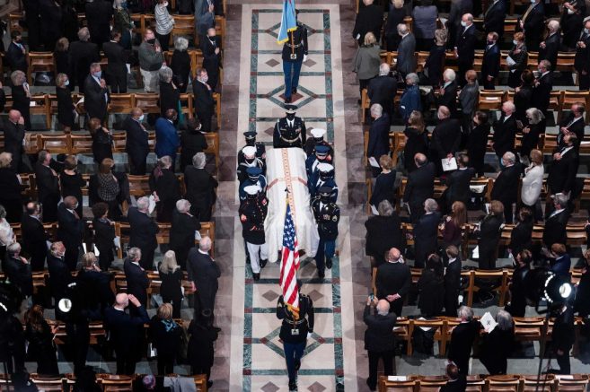 Members of the military honour guard carry the casket during the funeral service of former Secretary of State Colin Powell at the Washington National Cathedral on November 5, 2021 in Washington, DC. - Powell who was battling a rare blood cancer, died last month at 84 from complications related to Covid-19. (Photo by Jim WATSON / AFP) (Photo by JIM WATSON/AFP via Getty Images)
