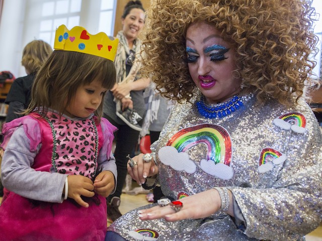 Nolte: Horrific Reality of Democrat Policies Red-Pilled America 3 In this Saturday, May 13, 2017 photo, Lil Miss Hot Mess, right, compares outfits with 2-year old Eva McInnes after reading to a group of children during the Feminist Press' presentation of Drag Queen Story Hour! at the Park Slope Branch of the Brooklyn Public Library, in New York. (AP Photo/Mary Altaffer)