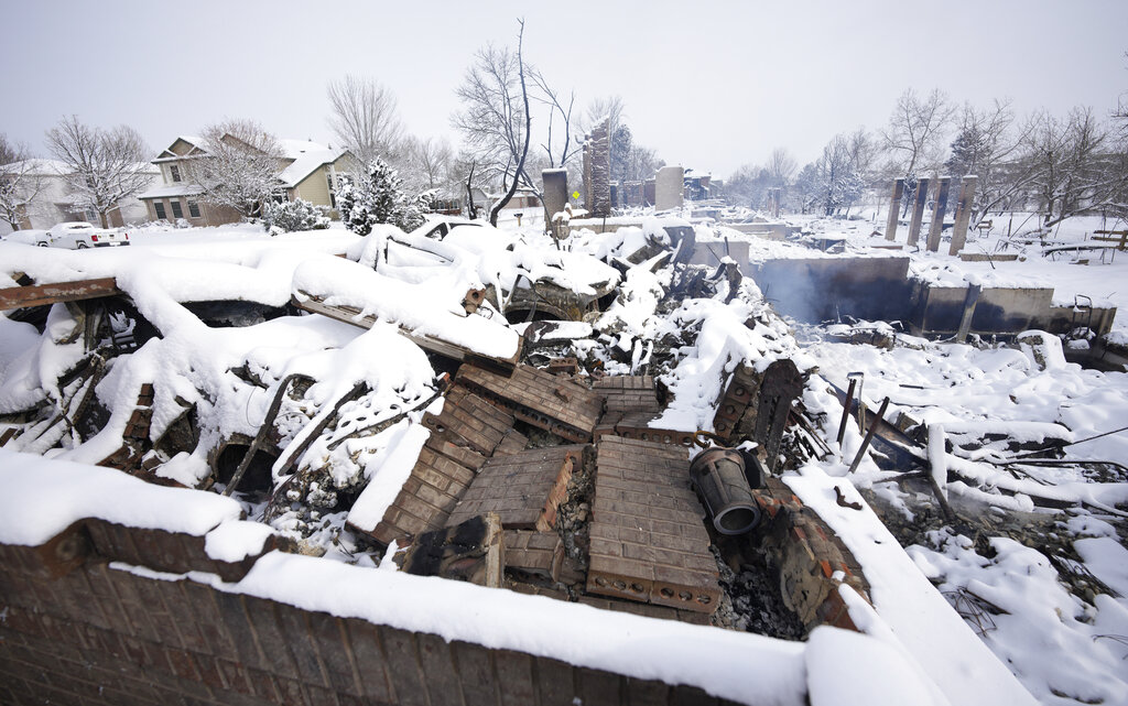 Colo. officials discuss fire aftermath, efforts to get Boulder community back up and running 1 The remains of a home destroyed by a pair of wildfires is draped by nearly a foot of snow after a winter storm rolled over the intermountain West, Saturday, Jan. 1, 2022, in Superior, Colo. Officials say that 991 homes were destroyed in Boulder County and 127 more were damaged in the Marshall Fire. (AP Photo/David Zalubowski)