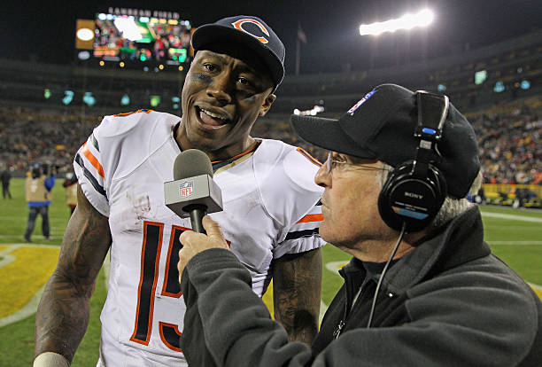 Brandon Marshall of the Chicago Bears talks to radio reporter Hub Arkush after a win against the Green Bay Packers at Lambeau Field on November 4,...