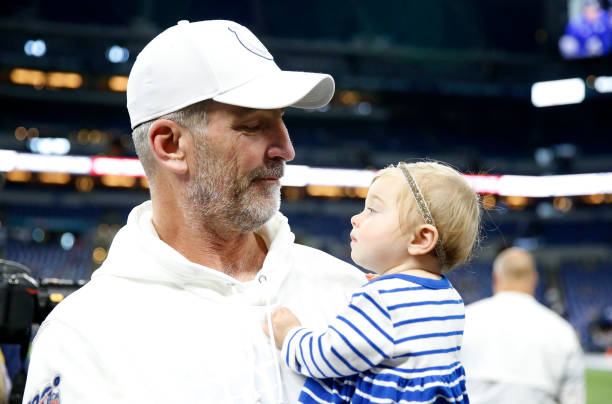 Head coach Frank Reich of the Indianapolis Colts holds his granddaughter before the game between the Indianapolis Colts and Miami Dolphins at Lucas...