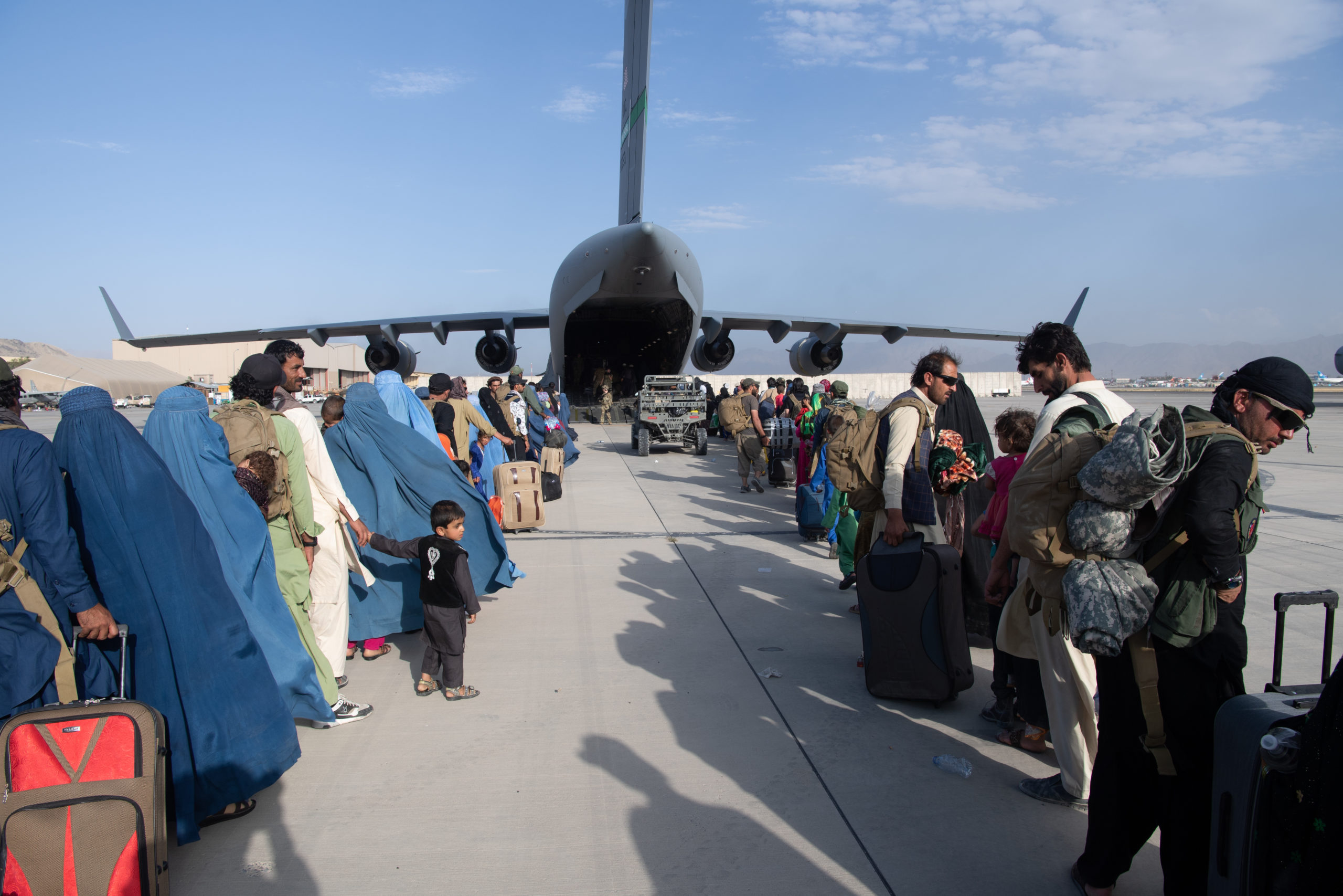 Commanders Involved In Chaotic Afghanistan Withdrawal Say White House, State Department Dismissed Warning Signs 1 KABUL, AFGHANISTAN - AUGUST 24: In this handout provided by U.S. Central Command Public Affairs, U.S. Air Force loadmasters and pilots assigned to the 816th Expeditionary Airlift Squadron, load passengers aboard a U.S. Air Force C-17 Globemaster III in support of the Afghanistan evacuation at Hamid Karzai International Airport (HKIA) on August 24, 2021 in Kabul, Afghanistan. The United States and allies urged Afghans to leave Kabul airport, citing the threat of terrorist attacks, as Western troops race to evacuate as many people as possible by August 31. (Photo by Master Sgt. Donald R. Allen/U.S. Air Forces Europe-Africa via Getty Images)