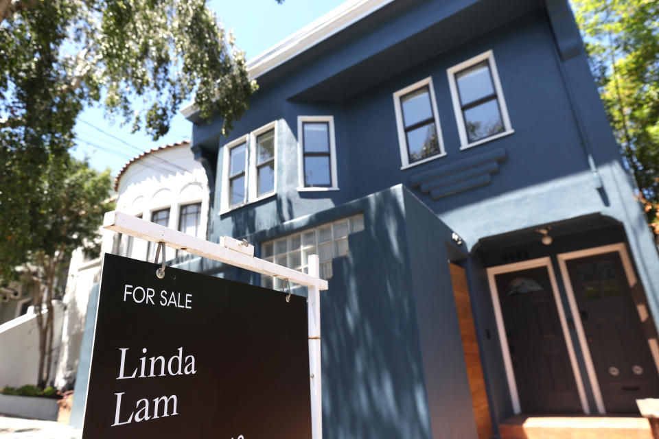 SAN FRANCISCO, CALIFORNIA - JULY 14: A sign is posted in front of a home for sale on July 14, 2022 in San Francisco, California. The number of homes for sale in the U.S. increased by 2 percent in June for the first time since 2019. High interest rates coupled with a faltering economy and surging home prices have kept many homebuyers out of the market. (Photo by Justin Sullivan/Getty Images)