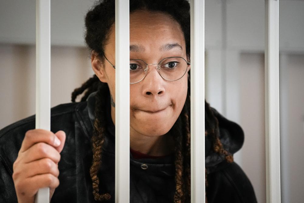 Russian Court Rejects WNBA Star Brittney Griner's Appeal of 9-Year Prison Sentence 3 FILE - WNBA star and two-time Olympic gold medalist Brittney Griner speaks to her lawyers standing in a cage at a court room prior to a hearing, in Khimki just outside Moscow, Russia, Tuesday, July 26, 2022. A Russian court has on Tuesday, Oct. 23 started hearing American basketball star Brittney Griner's appeal against her nine-year prison sentence for drug possession. (AP Photo/Alexander Zemlianichenko, Pool, File)