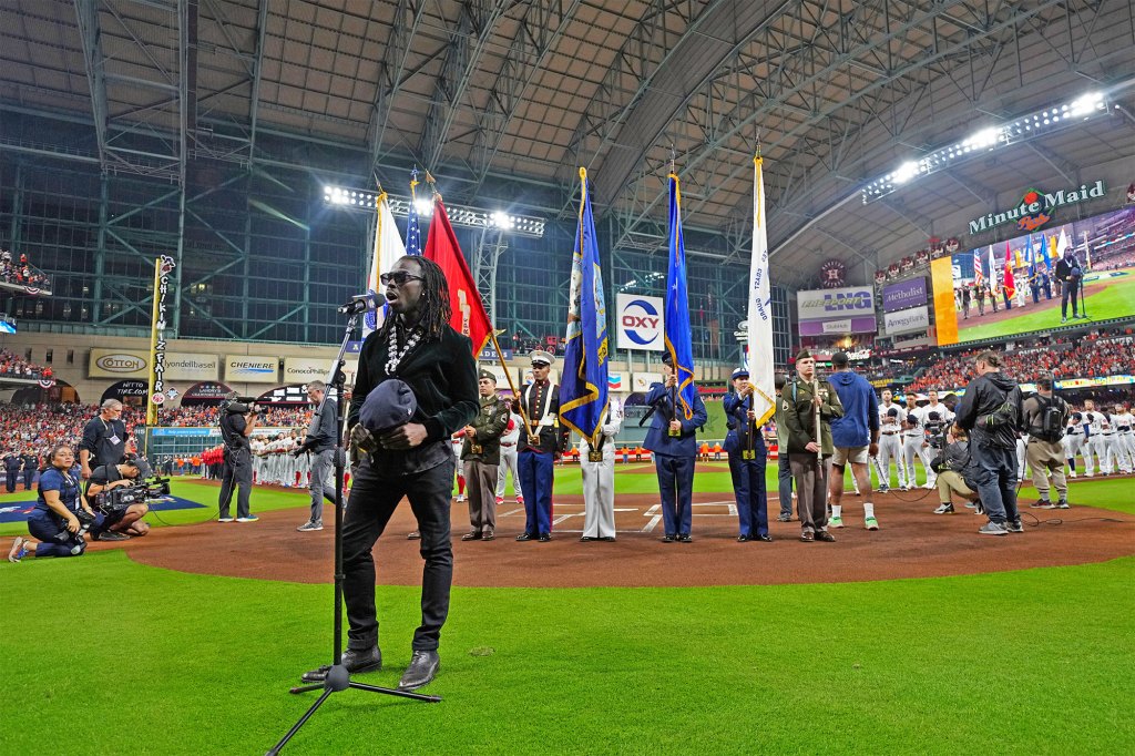 Grammy-Nominated Singer Eric Burton Forgets Words to National Anthem at World Series 1 Burton singing the national anthem